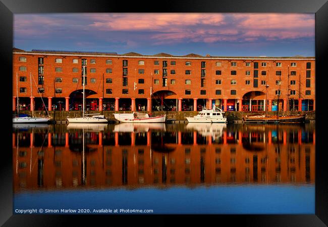 Small boats moored in Albert Dock Liverpool Framed Print by Simon Marlow