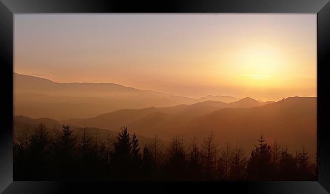 Sunset over welsh mountains  Framed Print by Mark Chadwick