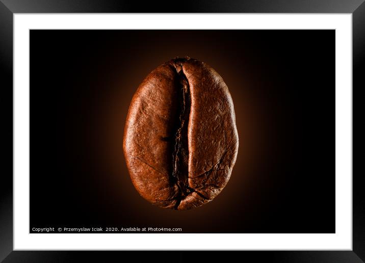 Single coffee bean against black background Framed Mounted Print by Przemek Iciak