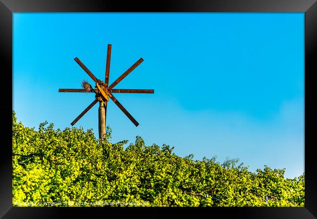 Wiew at wind mill on vineyard of south styrian wine route in Austria in sunset. Glanz an der Weinstrasse. Framed Print by Przemek Iciak