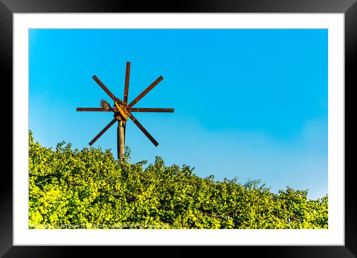 Wiew at wind mill on vineyard of south styrian wine route in Austria in sunset. Glanz an der Weinstrasse. Framed Mounted Print by Przemek Iciak