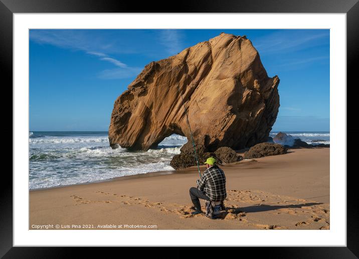 Fisherman in Praia de Santa Cruz beach rock boulder, Portugal Framed Mounted Print by Luis Pina