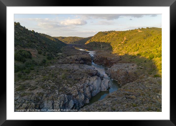 Pulo do Lobo waterfall drone aerial view with river guadiana and beautiful green valley landscape at sunset in Mertola Alentejo, Portugal Framed Mounted Print by Luis Pina