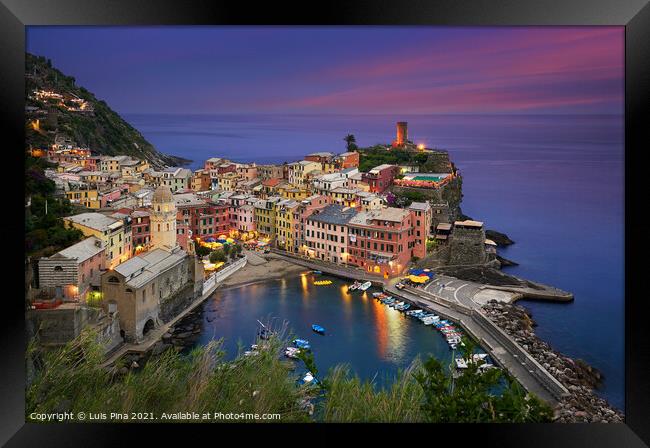 Vernazza city at night in Cinque Terre, Italy Framed Print by Luis Pina