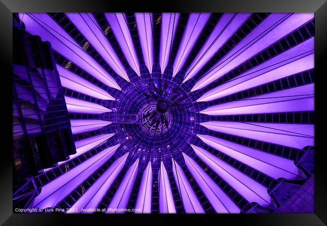 Sony Center in Berlin at night with purple lights on the ceiling Framed Print by Luis Pina