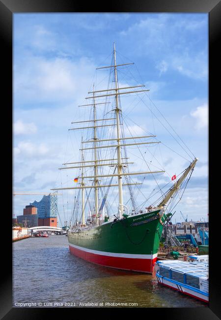 Beautiful green old boat with the Elbphilharmonie on the background Framed Print by Luis Pina