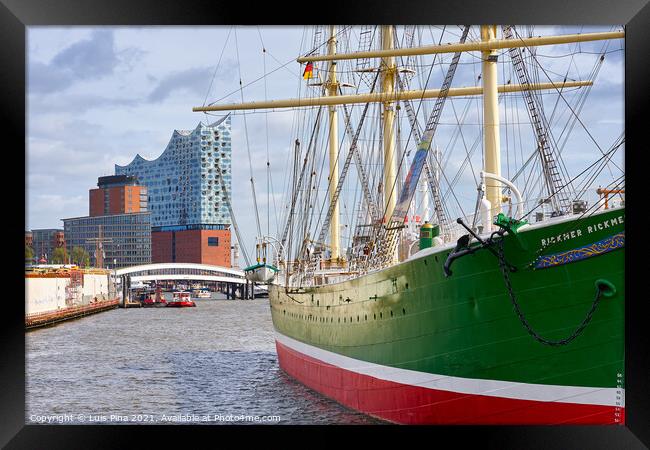 Beautiful green old boat with the Elbphilharmonie on the background Framed Print by Luis Pina