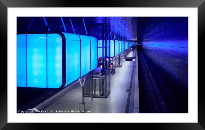Subway station with blue lights at University on the Speicherstadt area in Hamburg Framed Mounted Print by Luis Pina