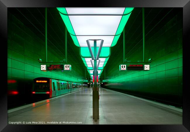 Subway station with green lights at University on the Speicherstadt area in Hamburg Framed Print by Luis Pina