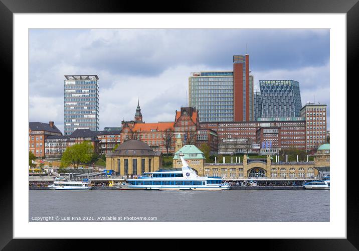 View of St. Pauli's Pier Landungsbrücken station tower with buildings and boats in Hamburg Framed Mounted Print by Luis Pina