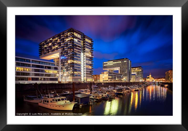 Rheinauhafen water promenade in Cologne Koeln marina at night with boats on the water Framed Mounted Print by Luis Pina