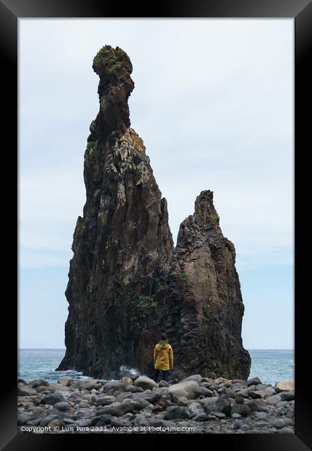 Woman looking at Ribeira da Janela islet in Madeira Framed Print by Luis Pina