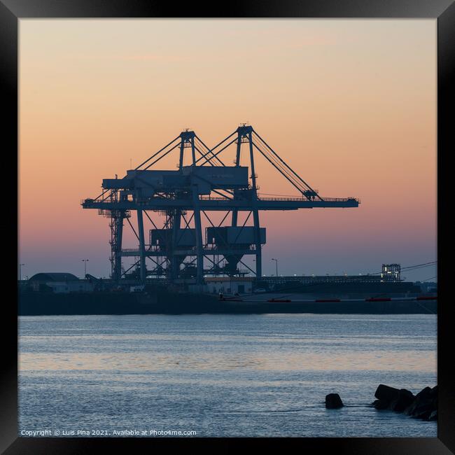 Sines container port terminal with cranes at sunset, in Portugal Framed Print by Luis Pina