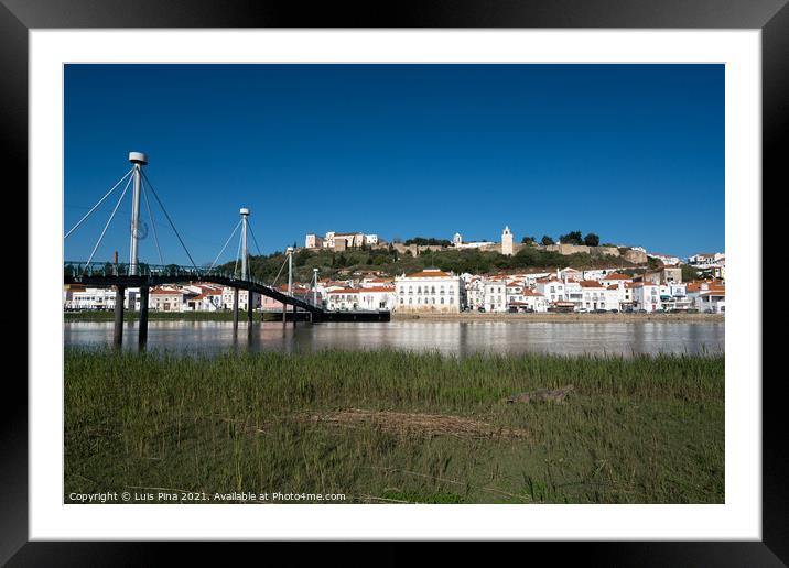 View of Alcacer do Sal cityscape from the other side of the Sado river and a bridge Framed Mounted Print by Luis Pina