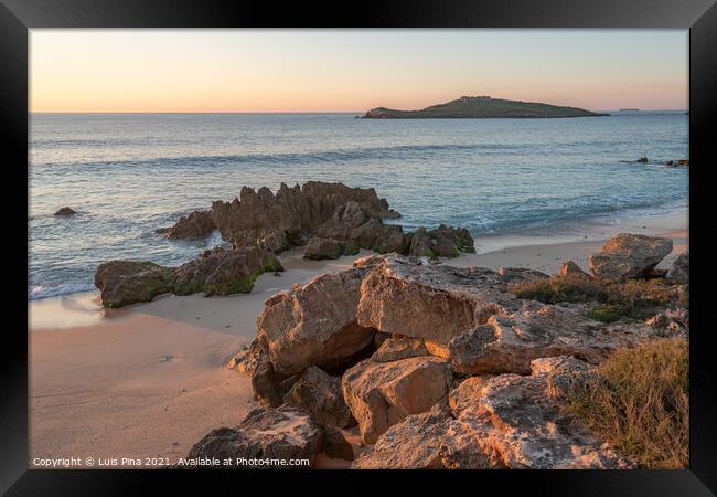 Porto Covo beach at sunset with Ilha do Pessegueiro Island on the background, in Portugal Framed Print by Luis Pina