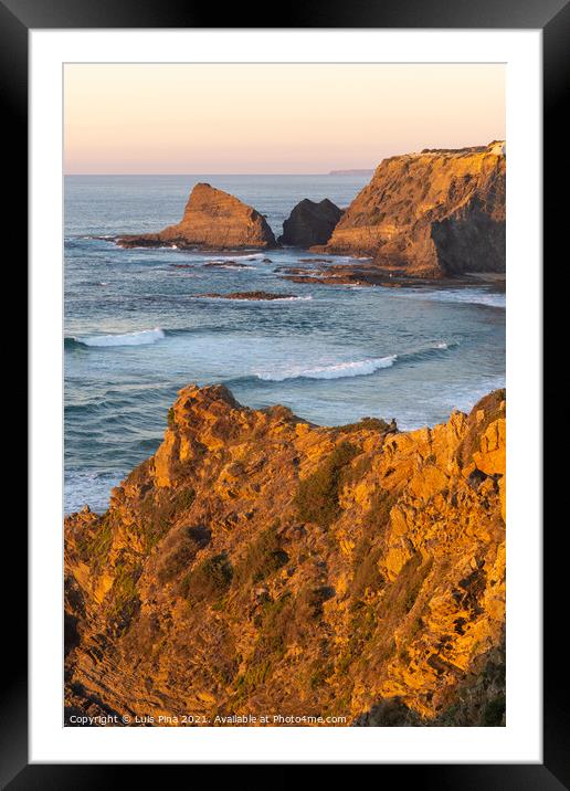 Woman on a cliff at Praia de Odeceixe in Costa Vicentina, Portugal Framed Mounted Print by Luis Pina