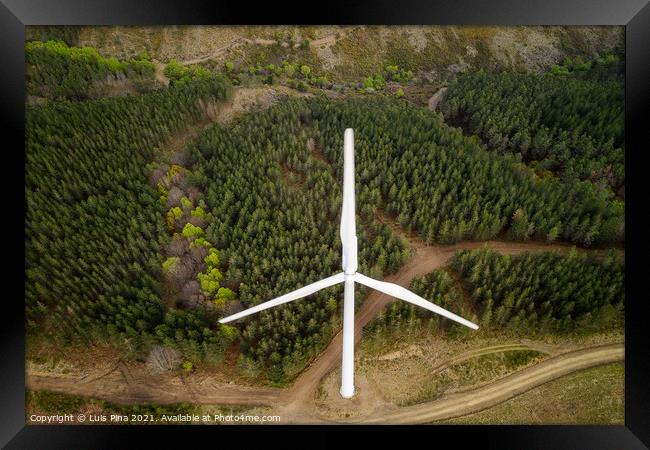 Wind turbines drone aerial view renewable energy on the middle of clouds in Serra da Lousa, Portugal Framed Print by Luis Pina