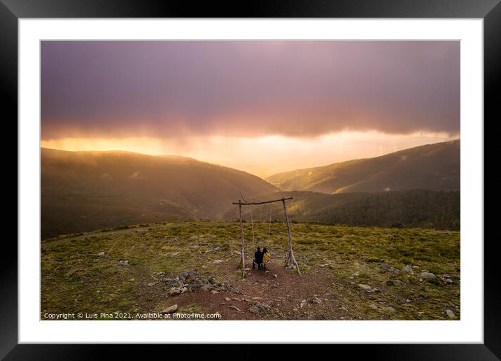 Romantic couple drone aerial view swinging on a Swing baloico in Lousa mountain social distancing, Portugal at sunset Framed Mounted Print by Luis Pina