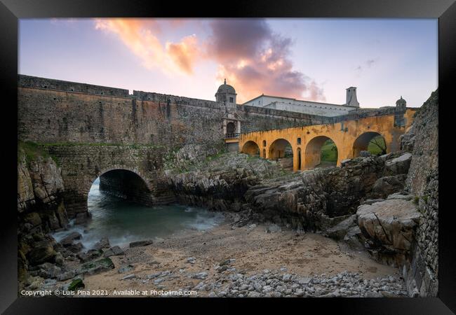 Peniche Fortress with beautiful historic bridge at sunset, in Portugal Framed Print by Luis Pina