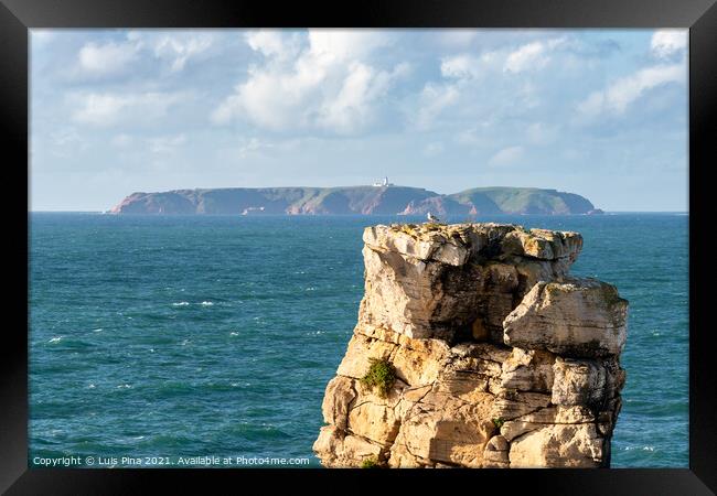 Peniche sea cliffs with Berlengas Island on the background with atlantic ocean, in Portugal Framed Print by Luis Pina