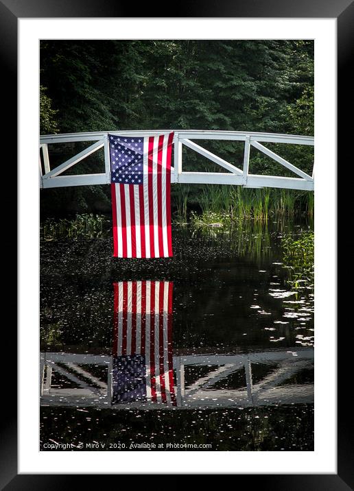 American flag hanging from wooden bridge in Somesv Framed Mounted Print by Miro V