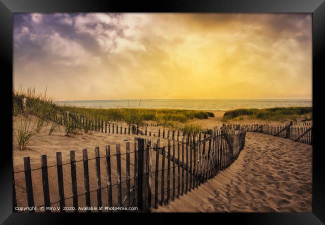 Beach with wooden fence and beautiful ocean view Framed Print by Miro V