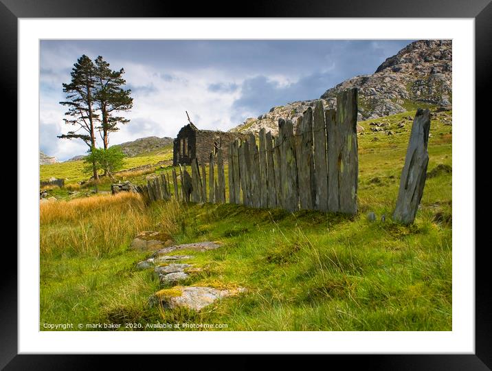 Slate wall and Chapel. Framed Mounted Print by mark baker