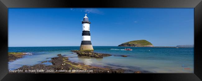 Puffin Island and Trwyn Du lighthouse. Framed Print by mark baker