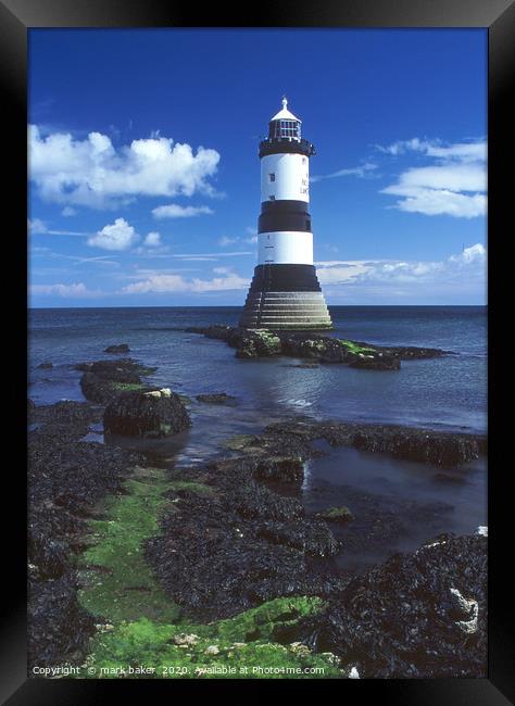 lighthouse at Penmon Point. Framed Print by mark baker
