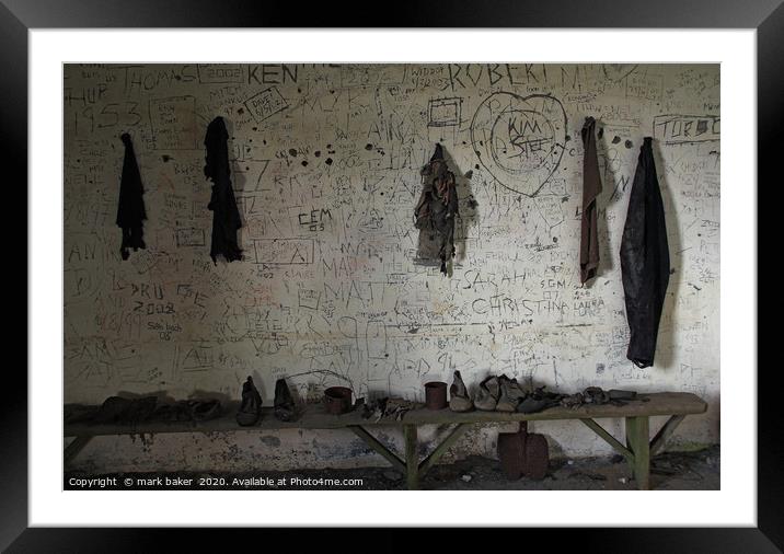 Boots,mess & grafitti. Framed Mounted Print by mark baker