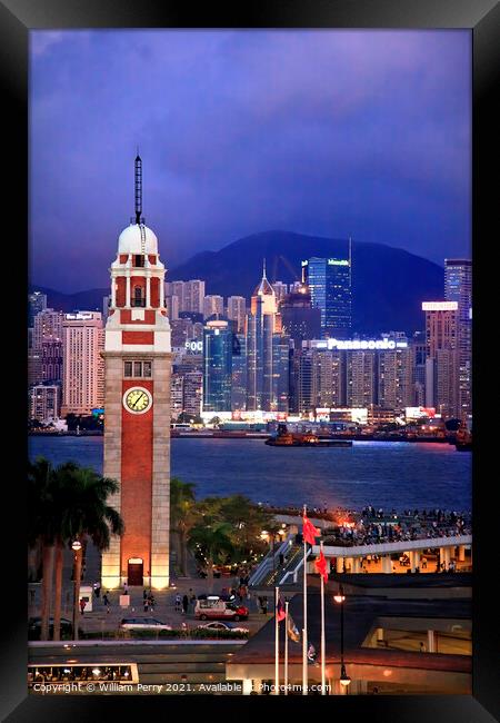 Hong Kong Clock Tower and Harbor at Night from Kowloon Ferry Framed Print by William Perry