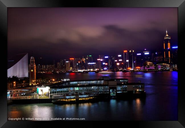 Hong Kong Harbor Clock Tower at Night from Kowloon Star Ferry Framed Print by William Perry