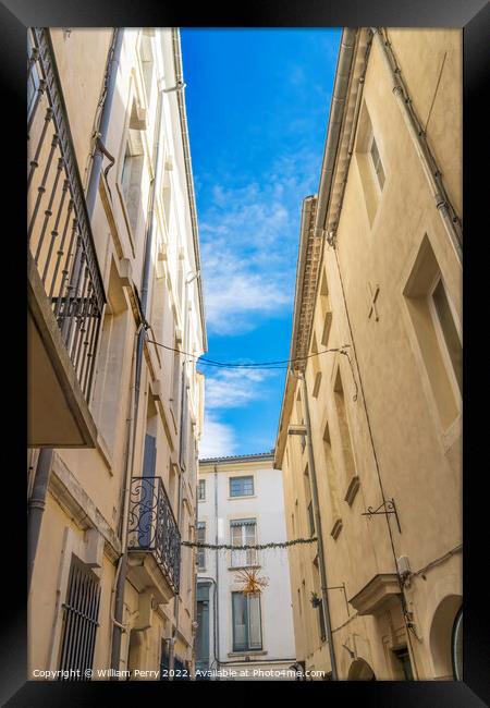 Apartments Balconies Christmas Decorations Narrow Street Nimes G Framed Print by William Perry