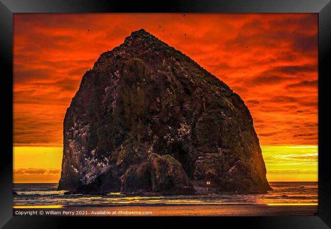 Colorful Sunset Haystack Rock Sea Stack Canon Beach Oregon Framed Print by William Perry