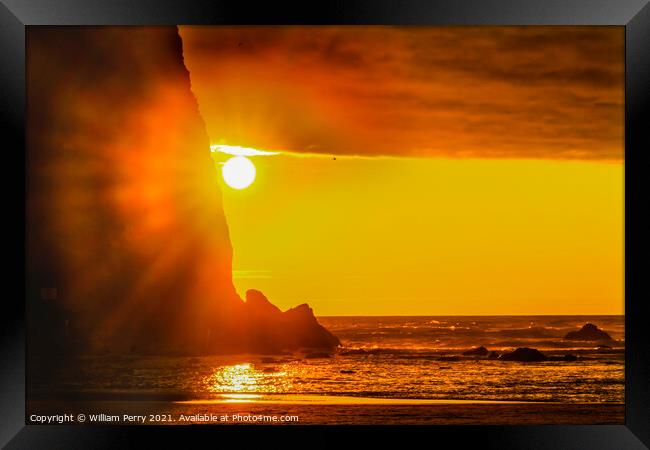 Colorful Sun Rays Haystack Rock Sea Stack Canon Beach Oregon Framed Print by William Perry