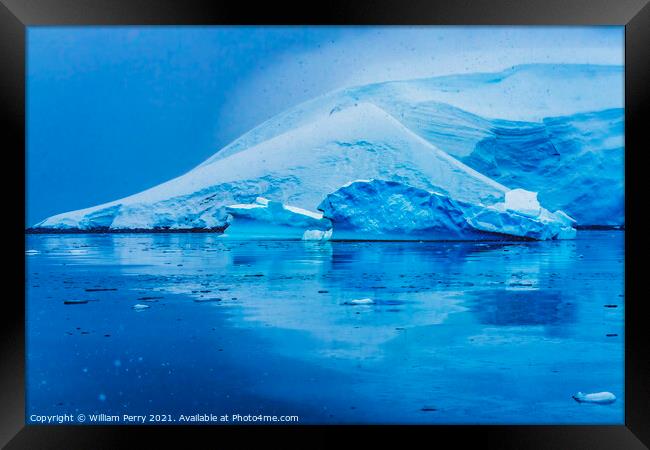 Snowing Blue Glacier Snow Mountains Paradise Bay Antrarctica Framed Print by William Perry