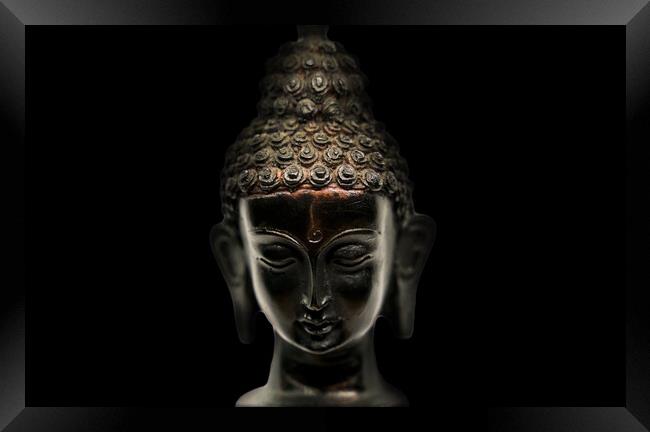 Buddha head black statue in a meditation state wit Framed Print by Arpan Bhatia