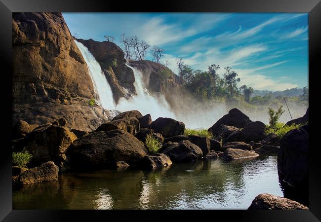 A landscape view of a waterfall named Athirapally Framed Print by Arpan Bhatia