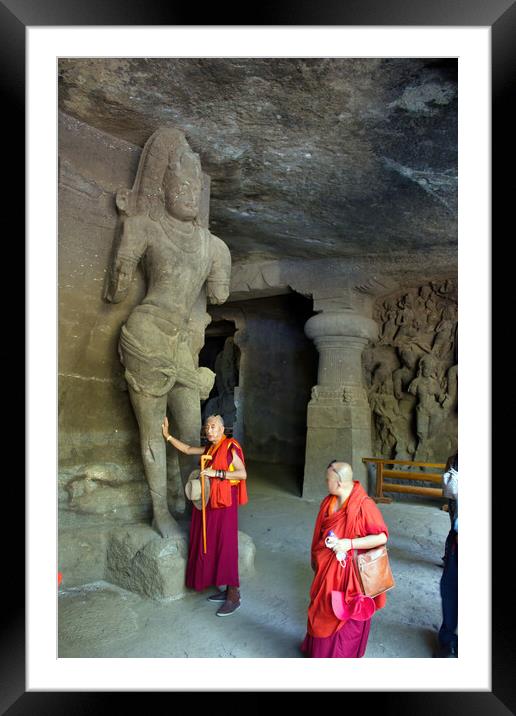 Mumbai, India - October 23, 2018: Interior of a Hindu God sculpture of Elephanta cave, late Gupta dating from between the 9th and 11th centuries, UNESCO World Heritage Site and buddhist monk tourist Framed Mounted Print by Arpan Bhatia