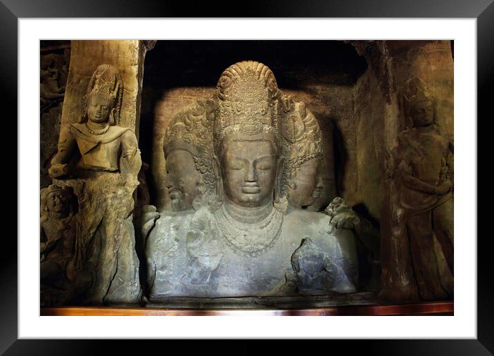 Mumbai, India - October 23, 2018: Interior of a Trimurti sculpture of Elephanta cave, late Gupta dating from between the 9th and 11th centuries, UNESCO World Heritage Site Framed Mounted Print by Arpan Bhatia