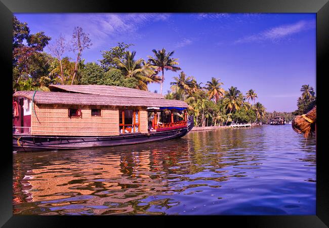 House boat in a the city of Kerala back waters in India Framed Print by Arpan Bhatia