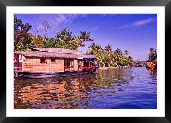 House boat in a the city of Kerala back waters in India Framed Mounted Print by Arpan Bhatia