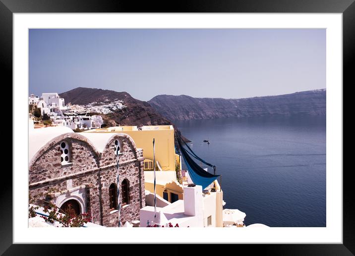 Santorini, Greece : Oia on the cliff line of the Caldera, Santorini, Cyclades situated on volcanic mountain in Geek famous island. Framed Mounted Print by Arpan Bhatia