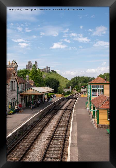 Corfe Castle and railway station Framed Print by Christopher Keeley