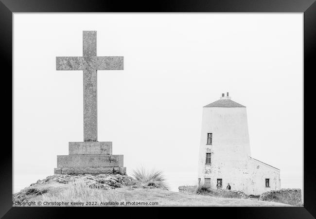 Twr Mawr lighthouse and Saxon cross Framed Print by Christopher Keeley