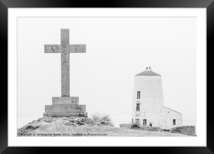 Twr Mawr lighthouse and Saxon cross Framed Mounted Print by Christopher Keeley