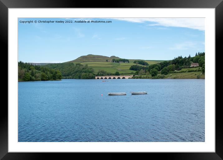 Fishing boats on Ladybower Reservoir Framed Mounted Print by Christopher Keeley