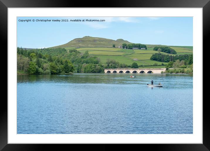 Fishing boat on Ladybower Reservoir Framed Mounted Print by Christopher Keeley