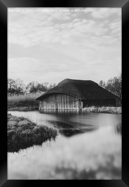 Hickling Broad boat house in monochrome Framed Print by Christopher Keeley