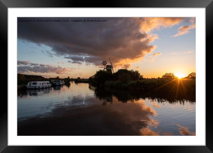 Sunset at Norfolk Broads windmill Framed Mounted Print by Christopher Keeley